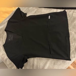 Women’s XS FIGS scrub top with two pockets.